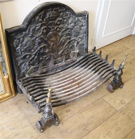 A cast iron fire back, basket and dogs basket W.90cm back W.84cm